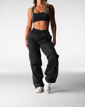 Load image into Gallery viewer, Black Stride Windbreaker Pants